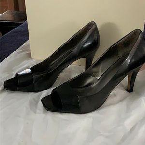 Black and Grey Patton leather peep toe pumps.